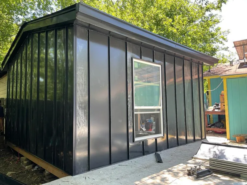 Black standing seam metal wall panels for Metal Roof Installation in Maine